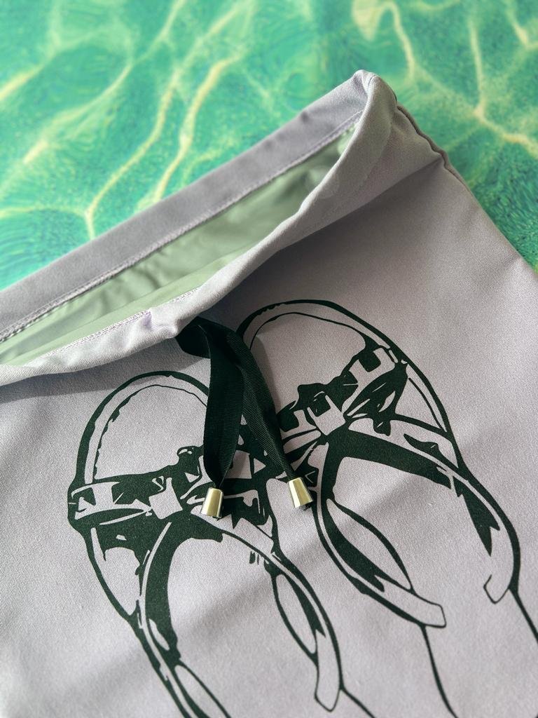 sacca-sandalias-humedas-alberca